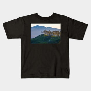 Sunrise over mountains covered with clouds Kids T-Shirt